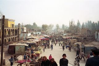 37 Kashgar Busy Street On The Way To Sunday Market 1993.jpg